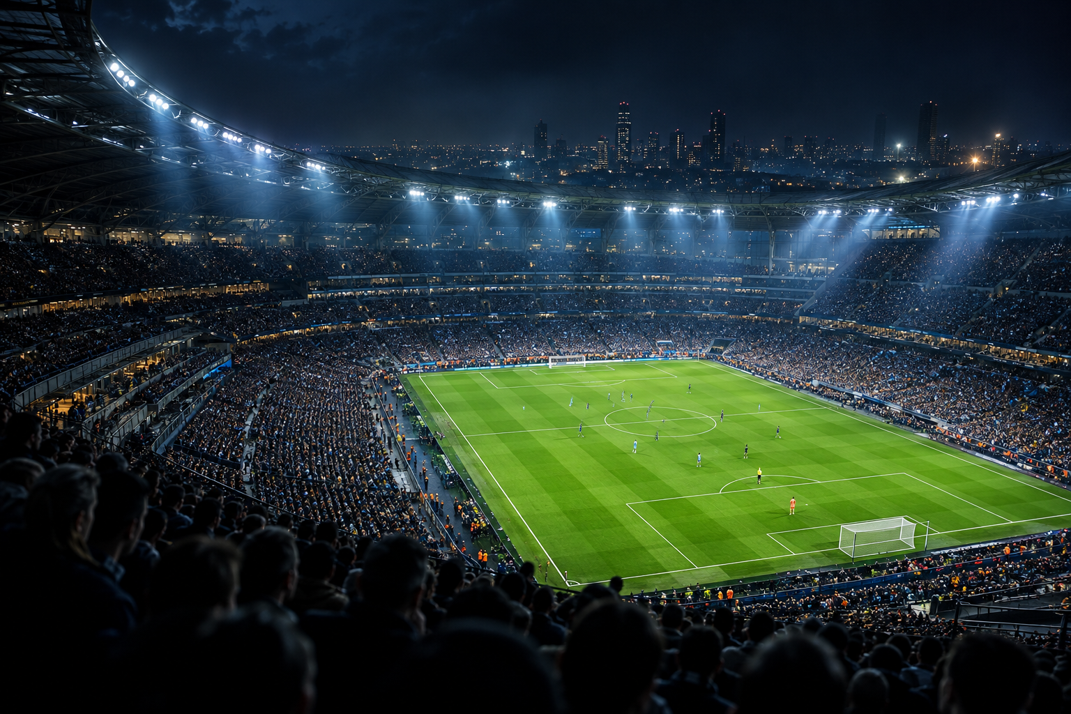 Football stadium illuminated for an evening match